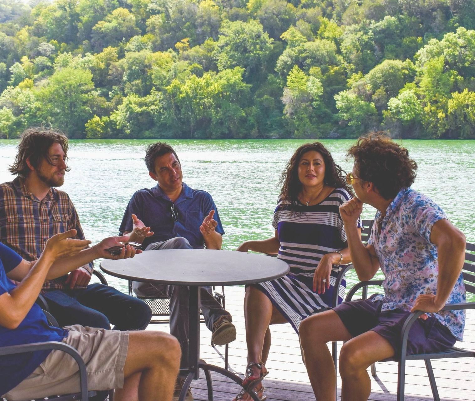 Clients and crew at the dock table