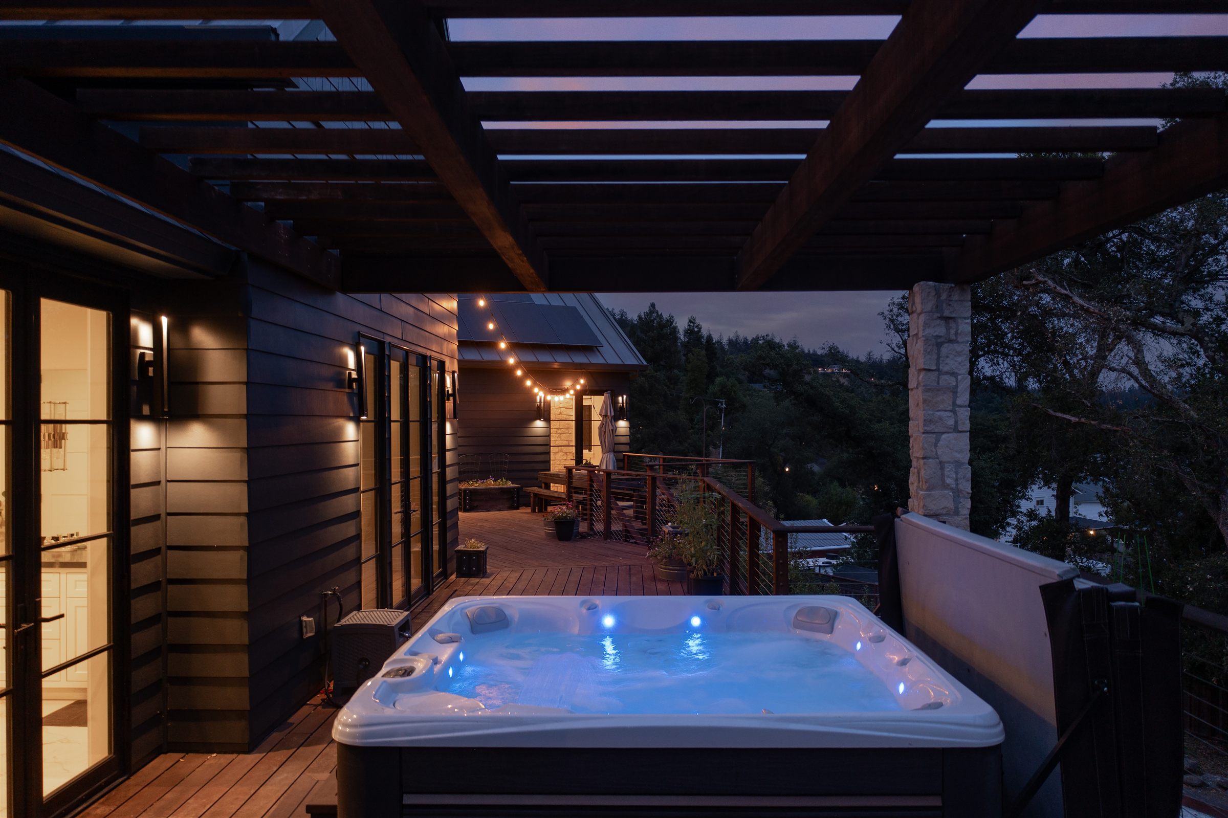 Backyard deck and seating at blue hour