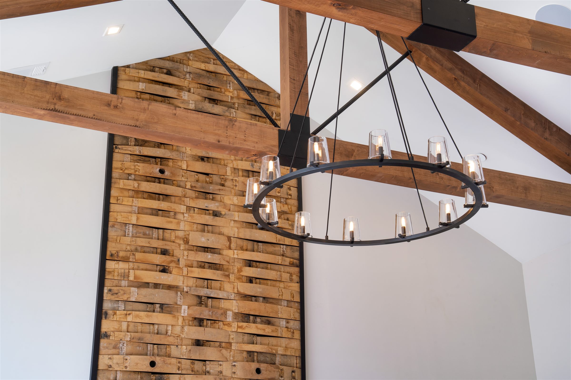 Refinished interior with wood beams and natural light